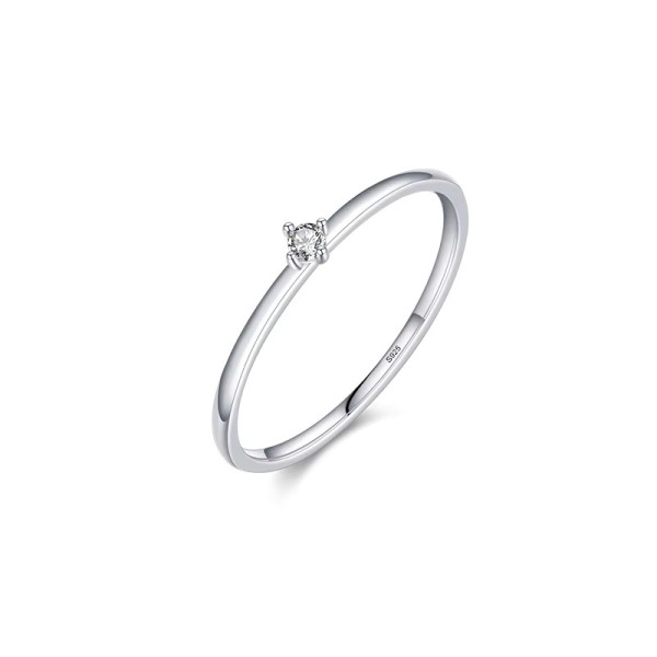 Stříbrný prsten s centrálním jemným zirkonem osazeným do 4 krapen