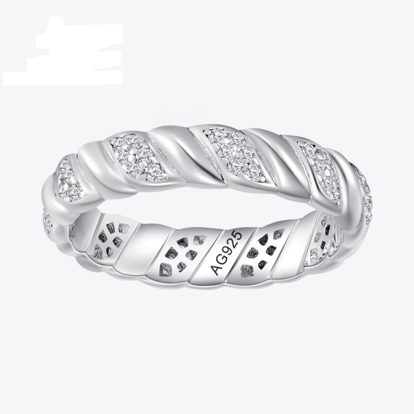 Stříbrný zatočený prsten zdobený zirkony